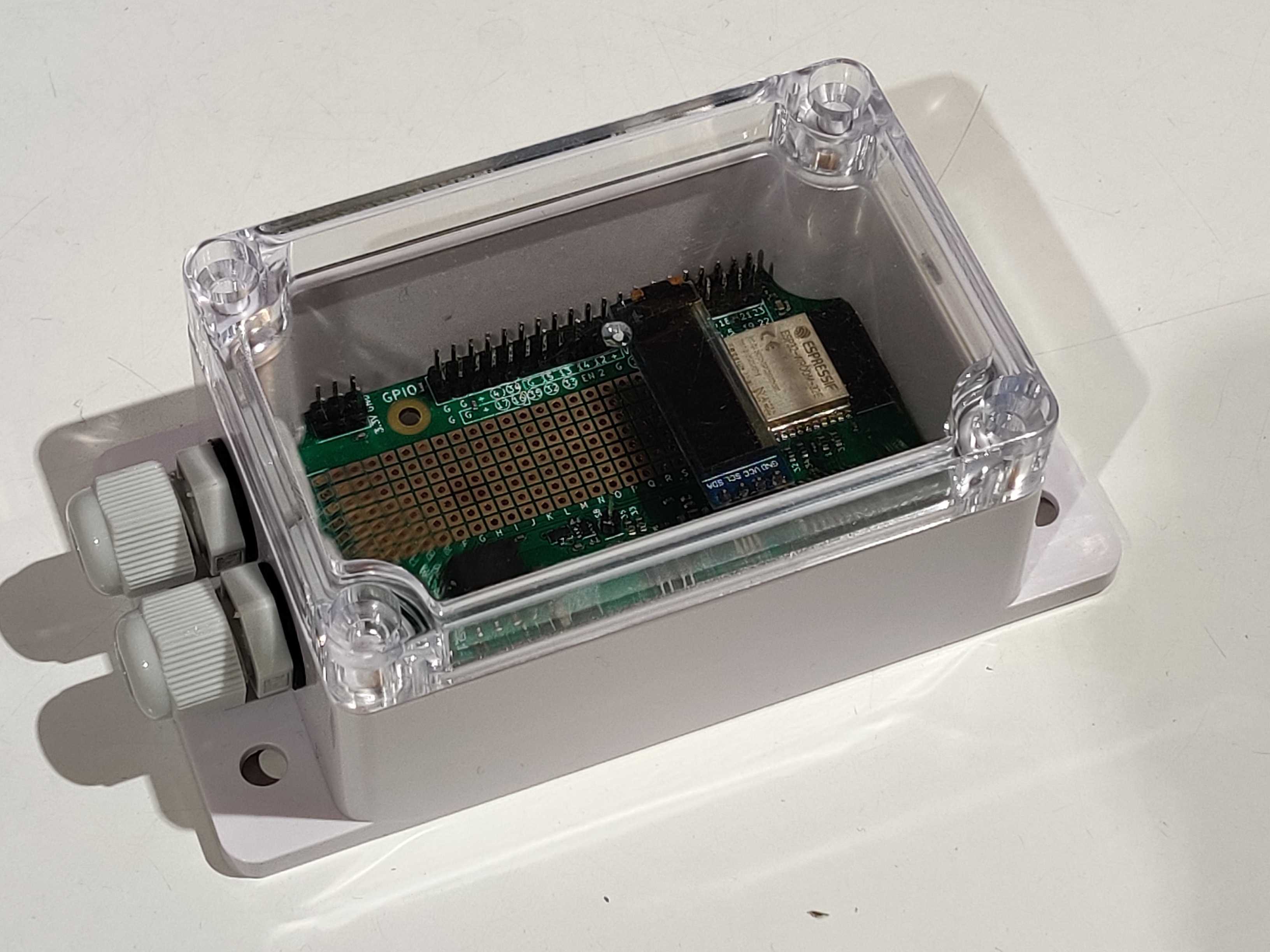 custom-built ESP32 development board in a waterproof enclosure