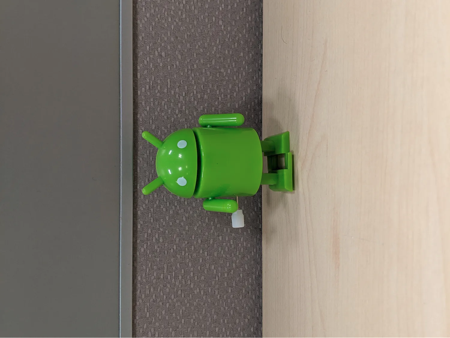 A landscape-shaped image with the bugdroid's head pointed to the left
