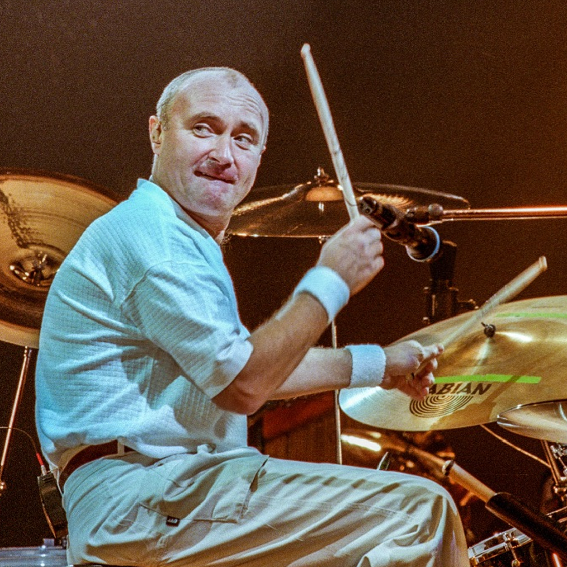 Photo of Phil Collins drumming