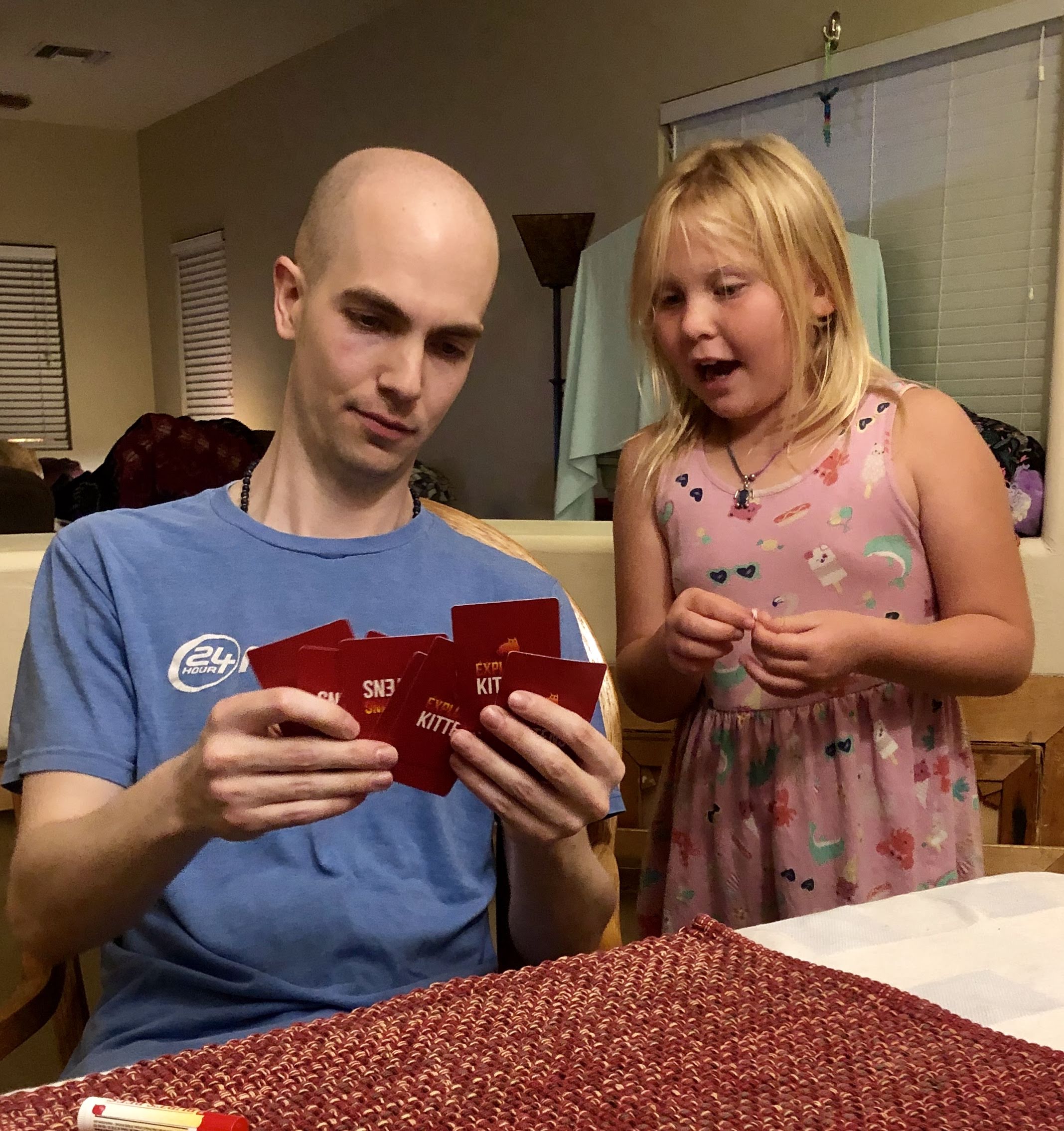 teaching Uncle Cameron to play exploding kittens