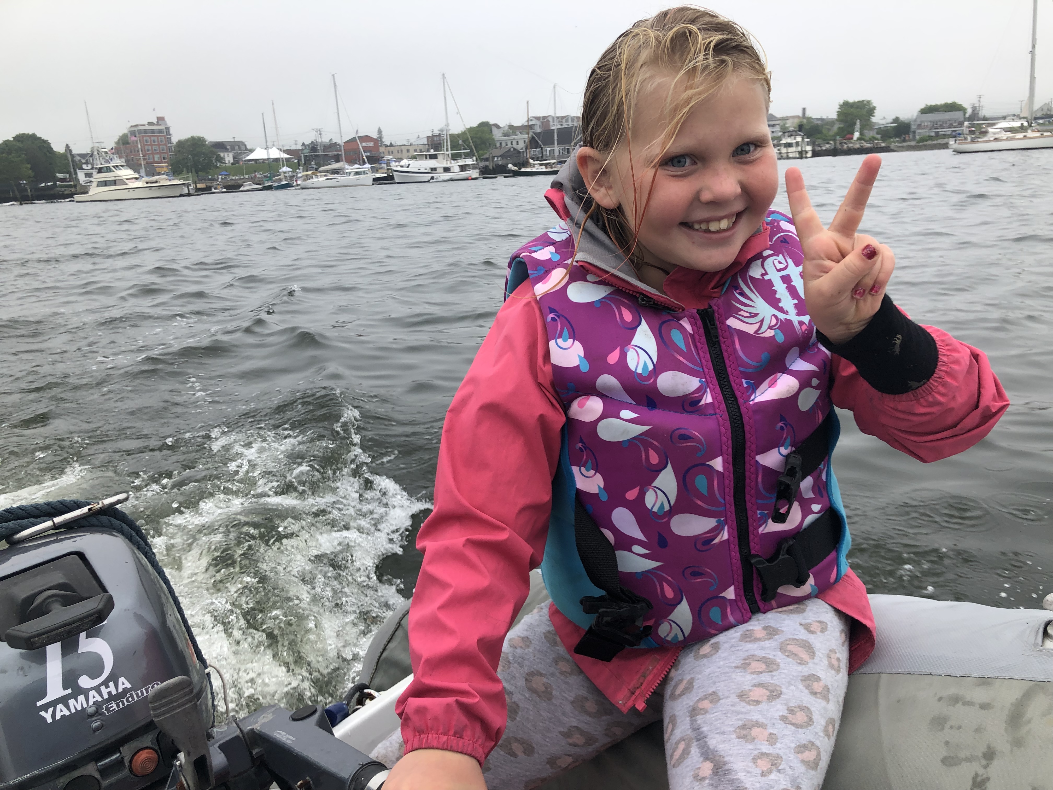 Lorelei driving the dinghy