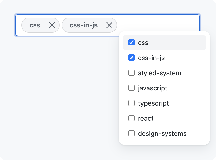 text input with tokens inside with an autocomplete menu below it