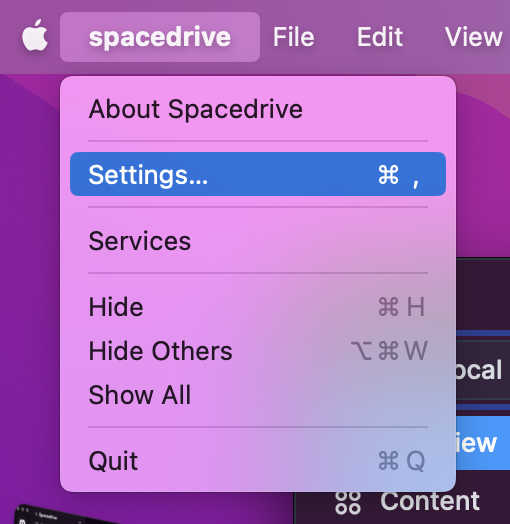A screenshot of the application menu on macOS with the Spacedrive item expanded, revealing a 'Settings...' item with a command-comma keyboard shortcut.
