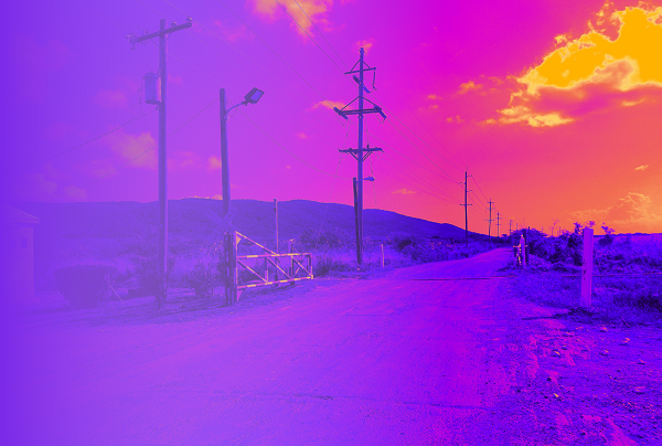image of lonely road and trainline with filter on picture