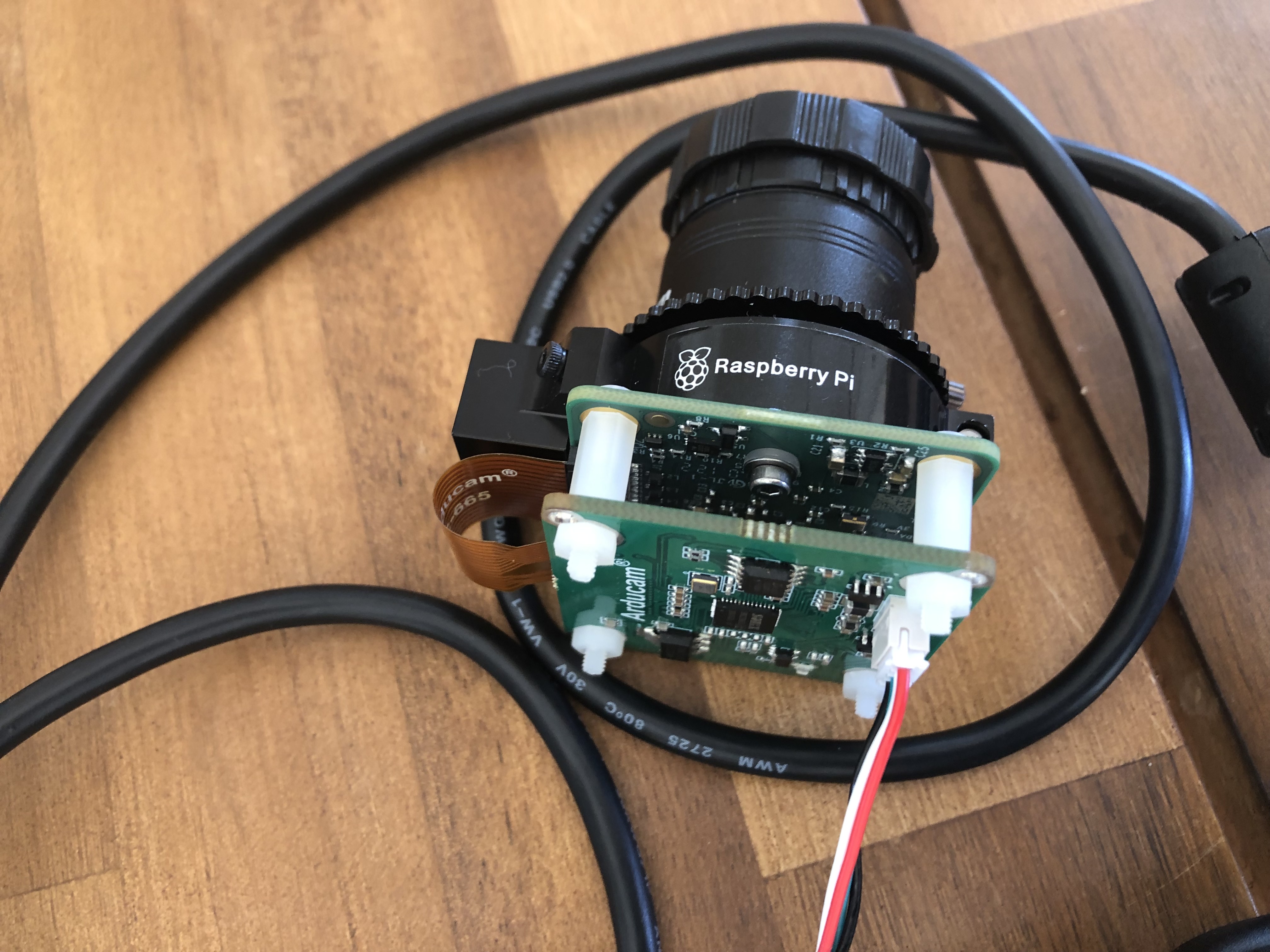 Close up of the adapted camera setup. The boards are connected by the orange cable that plugs into CSI sockets on the board.