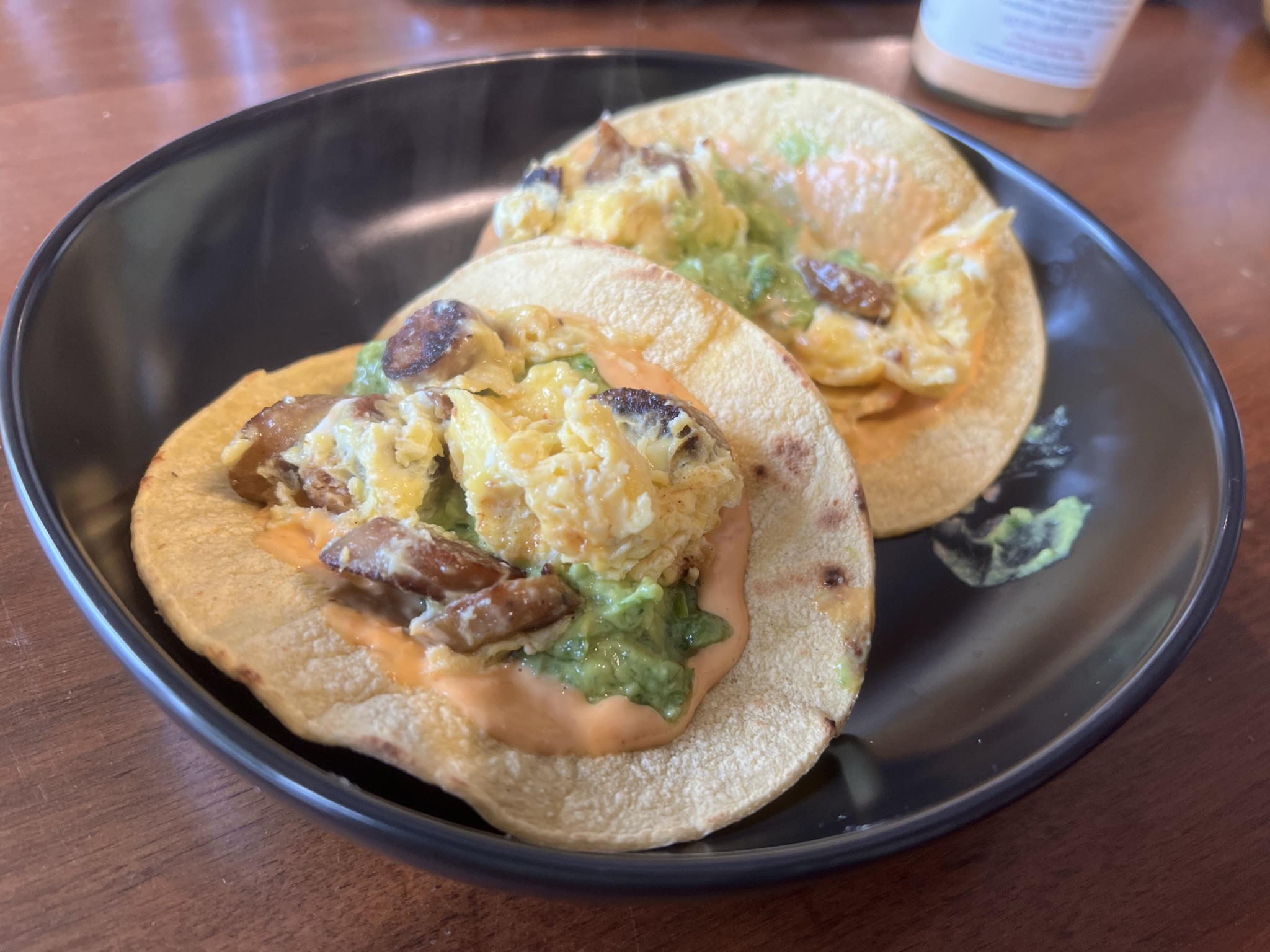 two breakfast tacos